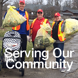 The Rotary Club of Cobourg Rotarians Serving the Community by Cleaning Up Trash in Park